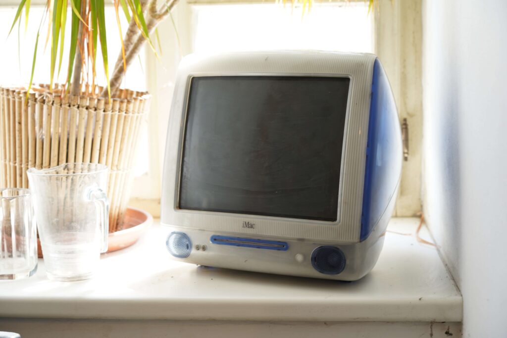 The Dawn of Digital Quirkiness - Old iMac Computer