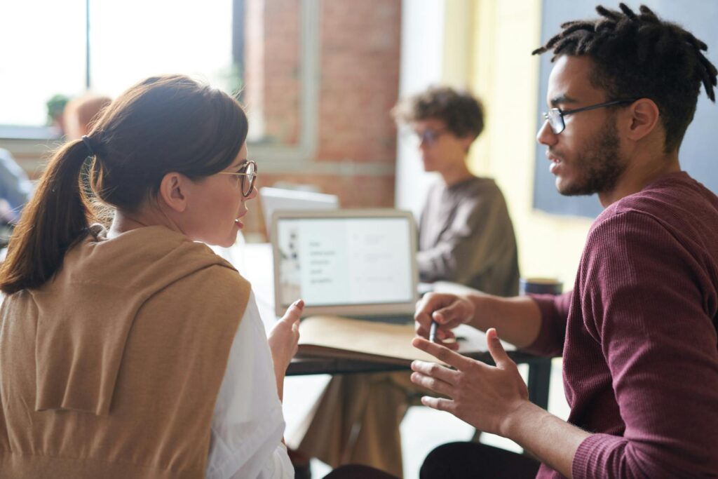A woman talking to a guy about Understanding the Reselling Process